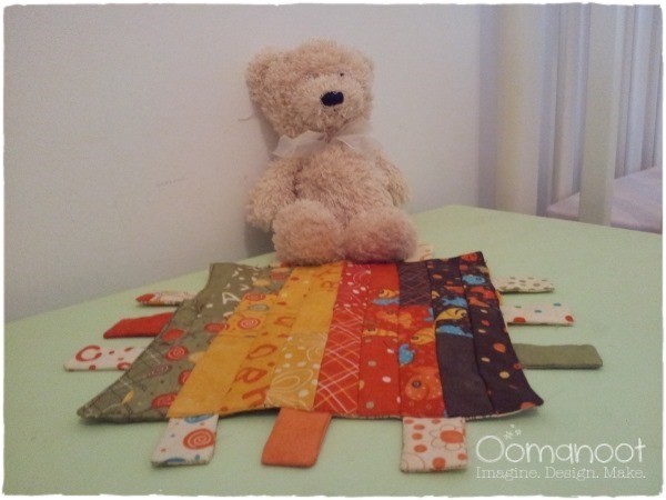 Oomanoot | A Baby Gift that Works Like a Charm (Pack) – Part 2: Tag Blanket Tutorial